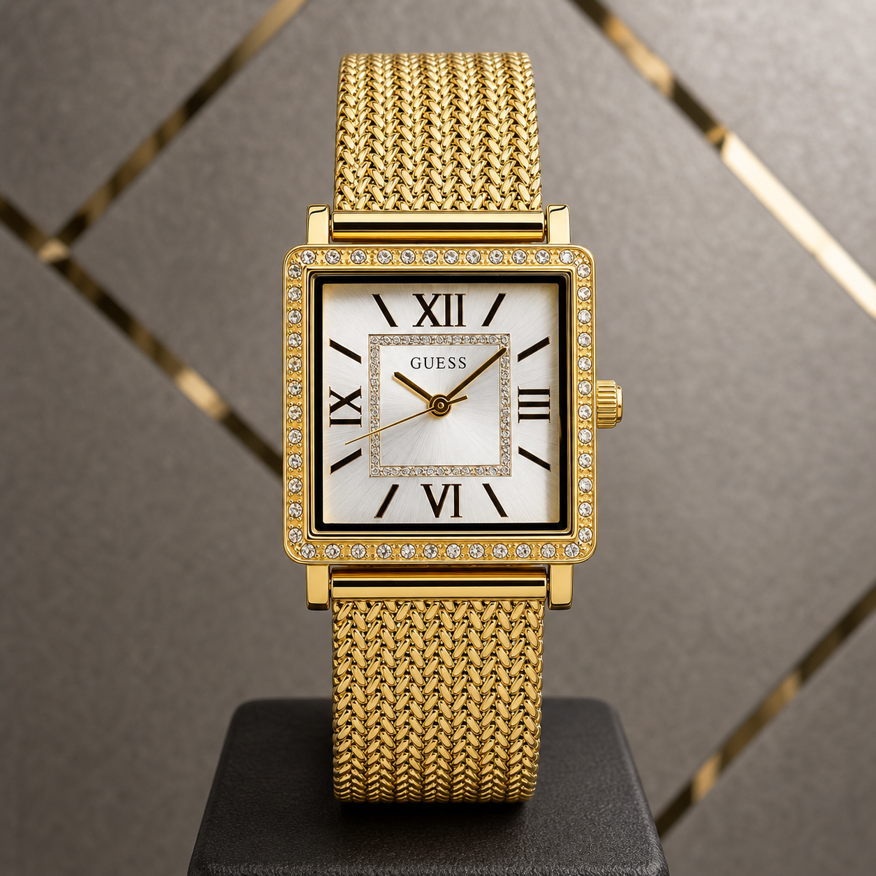 Close view of Guess Classic square white dial and gold mesh bracelet