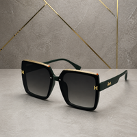 Hermes oversized square sunglasses in deep forest green, hero view