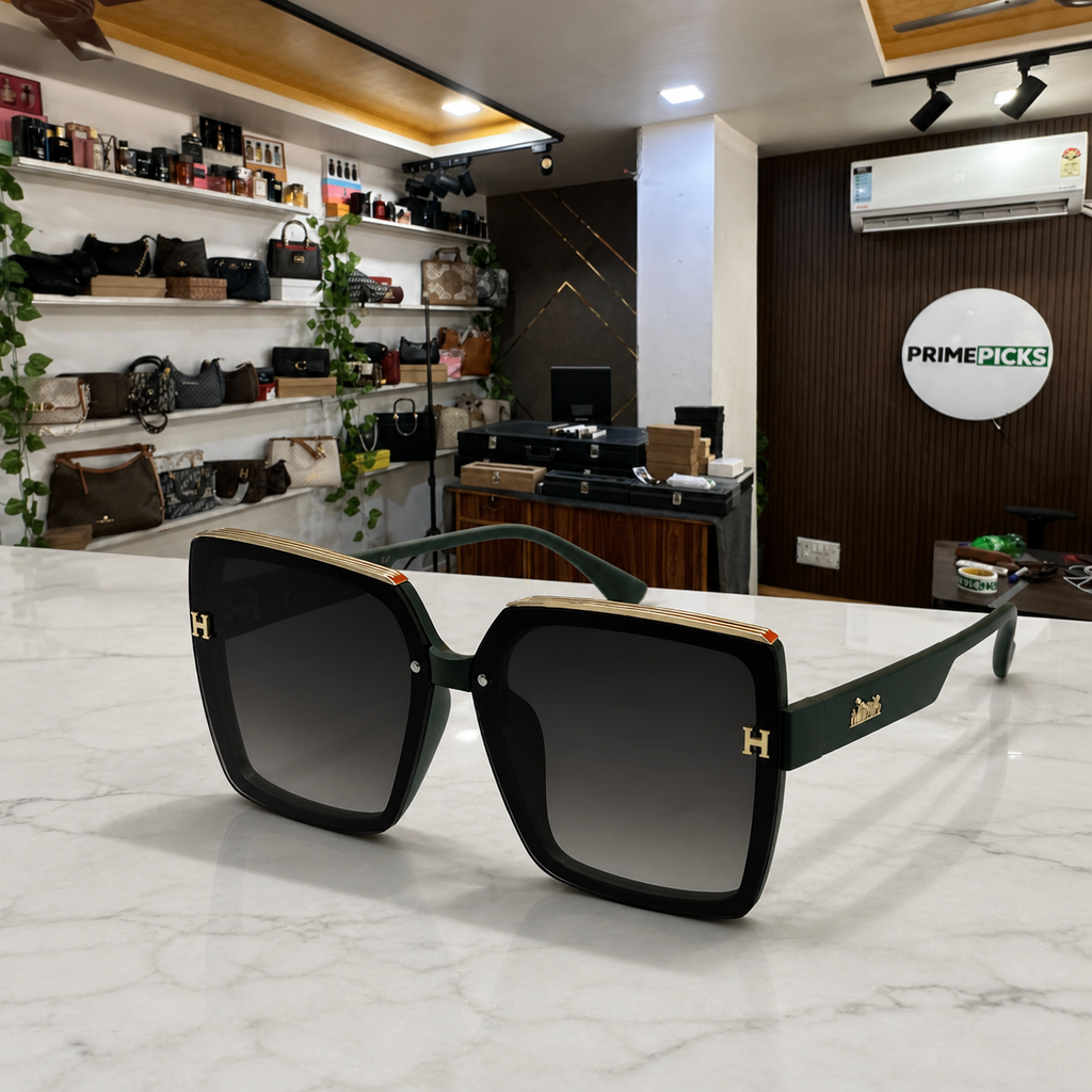 Hermes oversized square sunglasses in deep forest green, PrimePicks office display