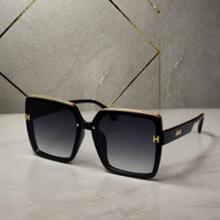 Hermes oversized square sunglasses in glossy black, hero view