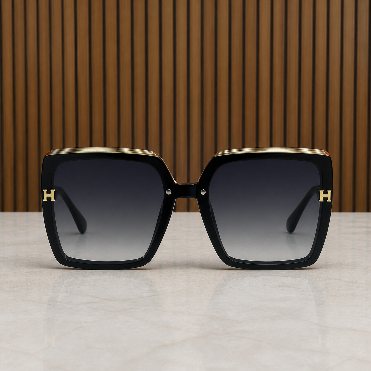 Hermes oversized square sunglasses in glossy black, front view
