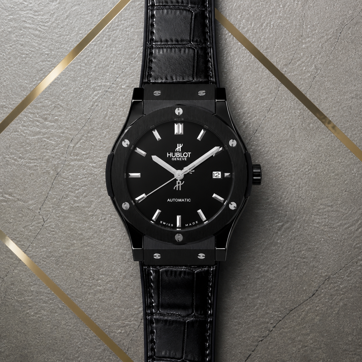 Hublot Classic Fusion black automatic watch on Primepicks grey office wall