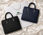 Black and Navy Blue Lacoste laptop bags displayed together