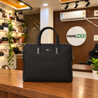 Lacoste structured laptop bag in Black in a PrimePicks office setting