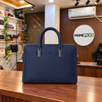 Lacoste structured laptop bag in Navy Blue in a PrimePicks office setting