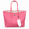 Lacoste large zip shopper tote bag in pink on a white background
