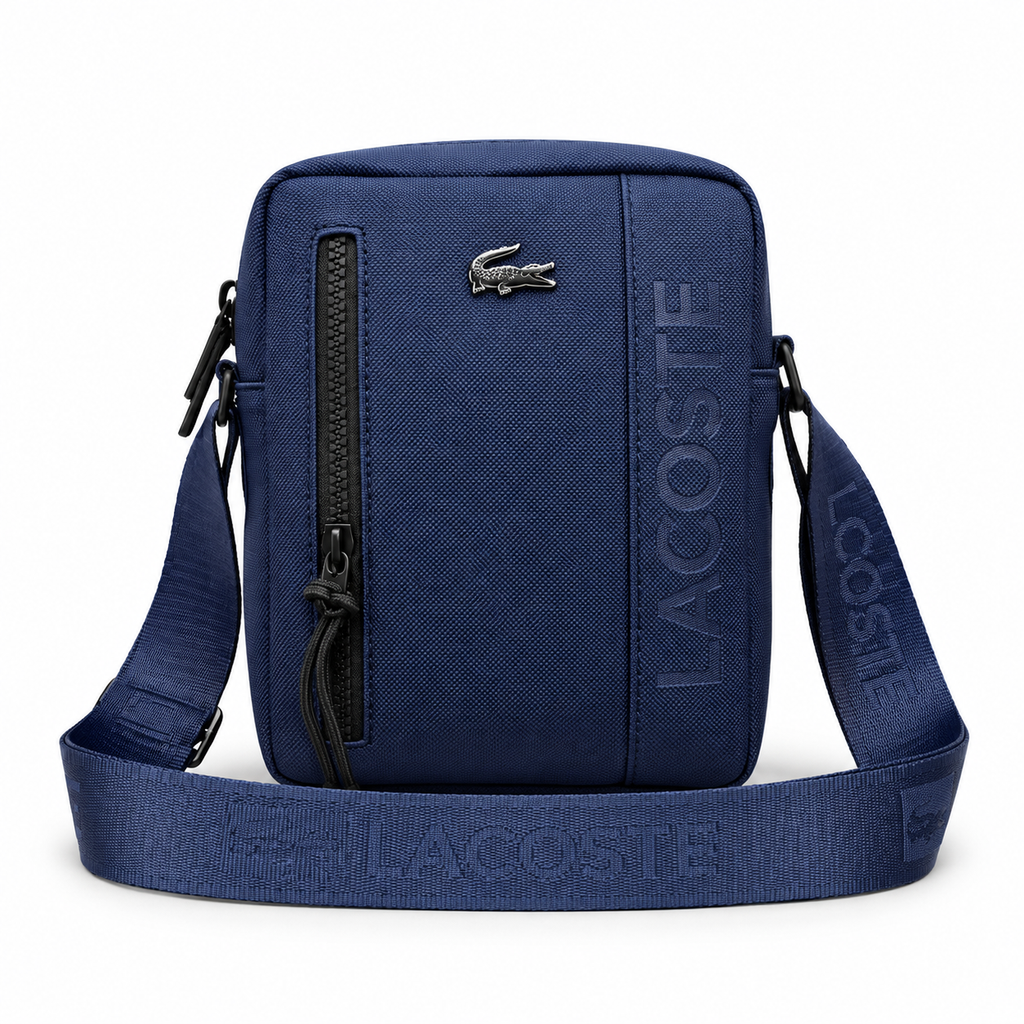Lacoste On The Go small messenger bag in Navy on a white background