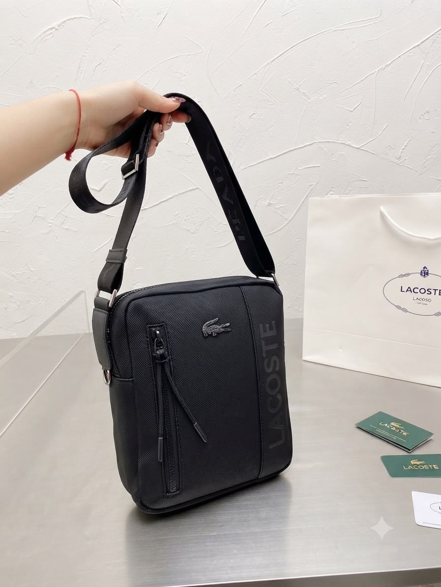 Lacoste On The Go small messenger bag in Black with adjustable strap