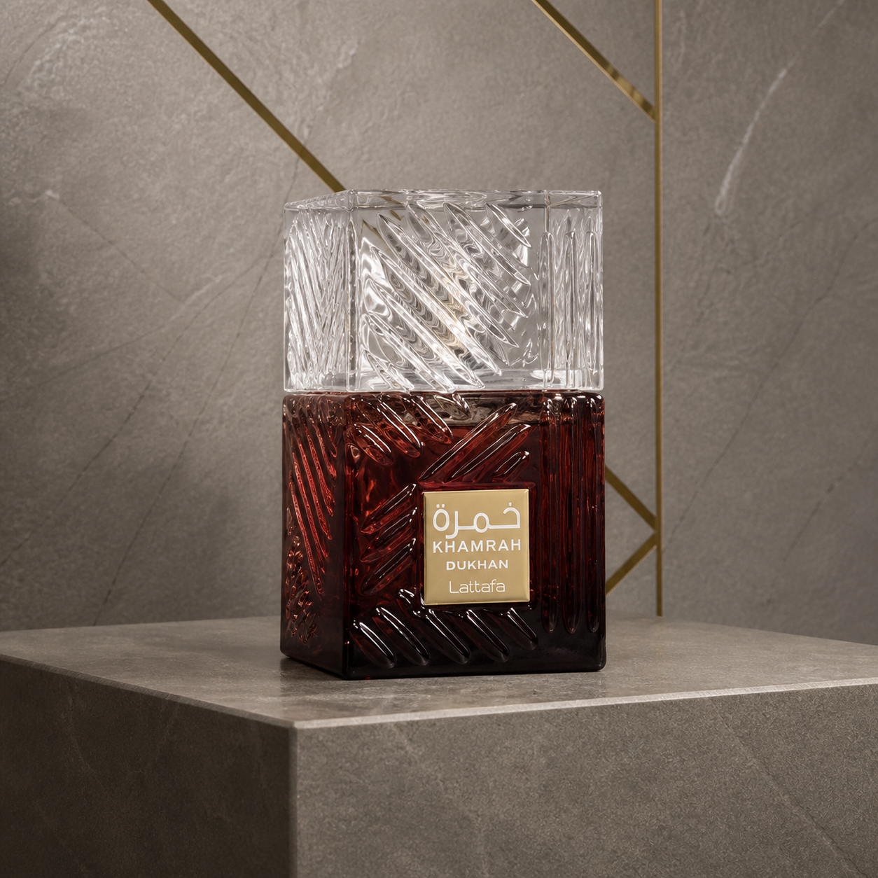 Lattafa Khamrah Dukhan 30ml bottle against the PrimePicks stone wall