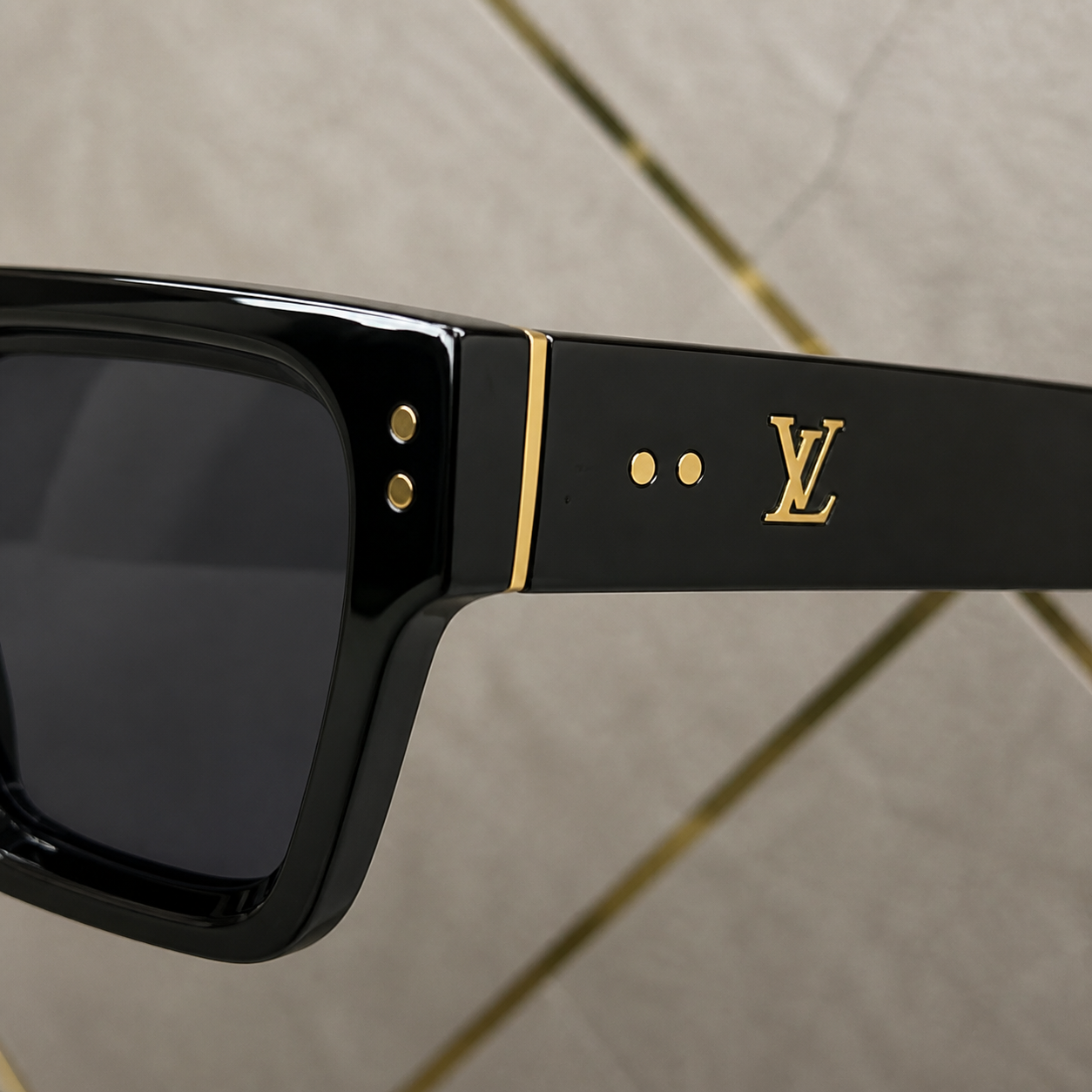 Louis Vuitton sunglasses gold-tone dot hinge trim and temple emblem detail