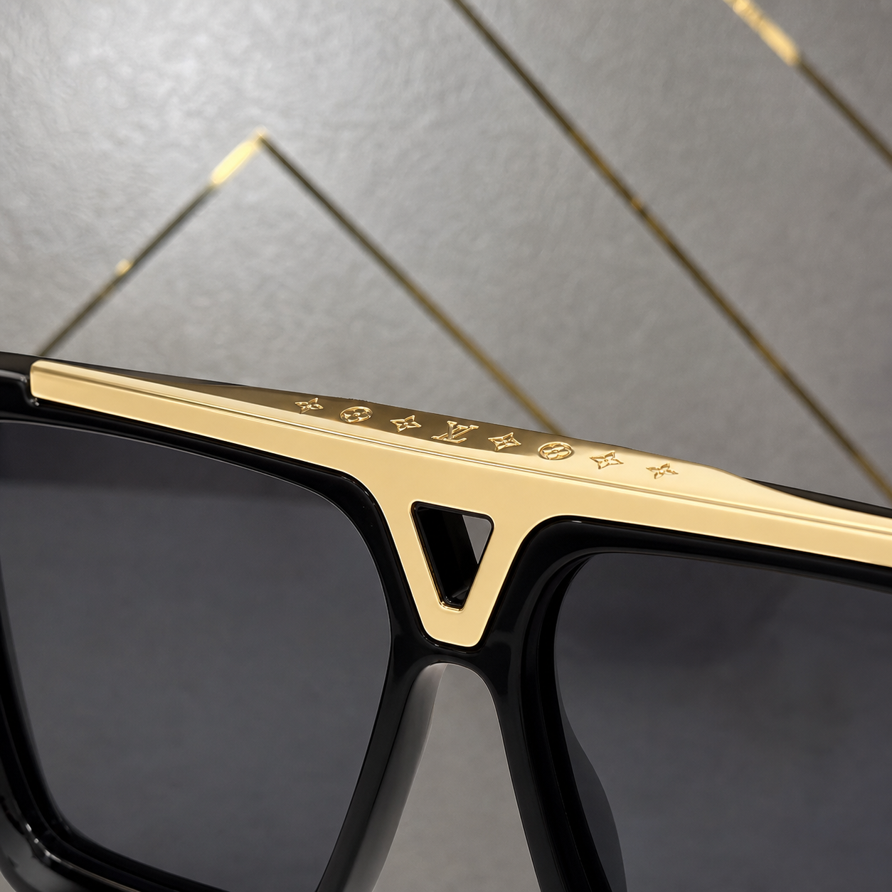 Louis Vuitton sunglasses gold-tone brow bar and center cutout detail