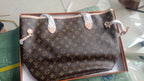 Louis Vuitton Neverfull-style tote shown with included box
