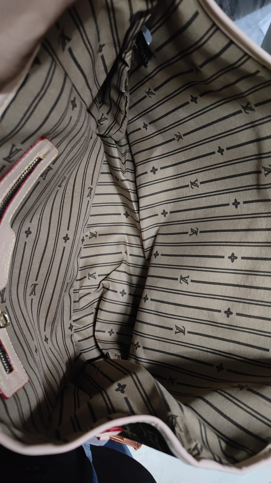 Louis Vuitton Neverfull-style tote branded interior and zip pocket