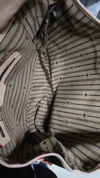 Louis Vuitton Neverfull-style tote branded interior and zip pocket