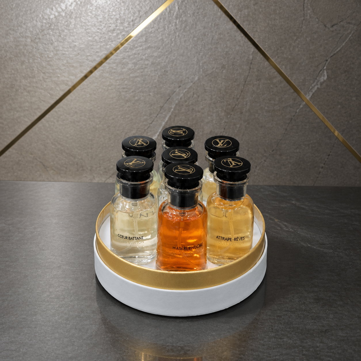 Louis Vuitton seven-piece 30ml perfume gift set against the PrimePicks stone wall