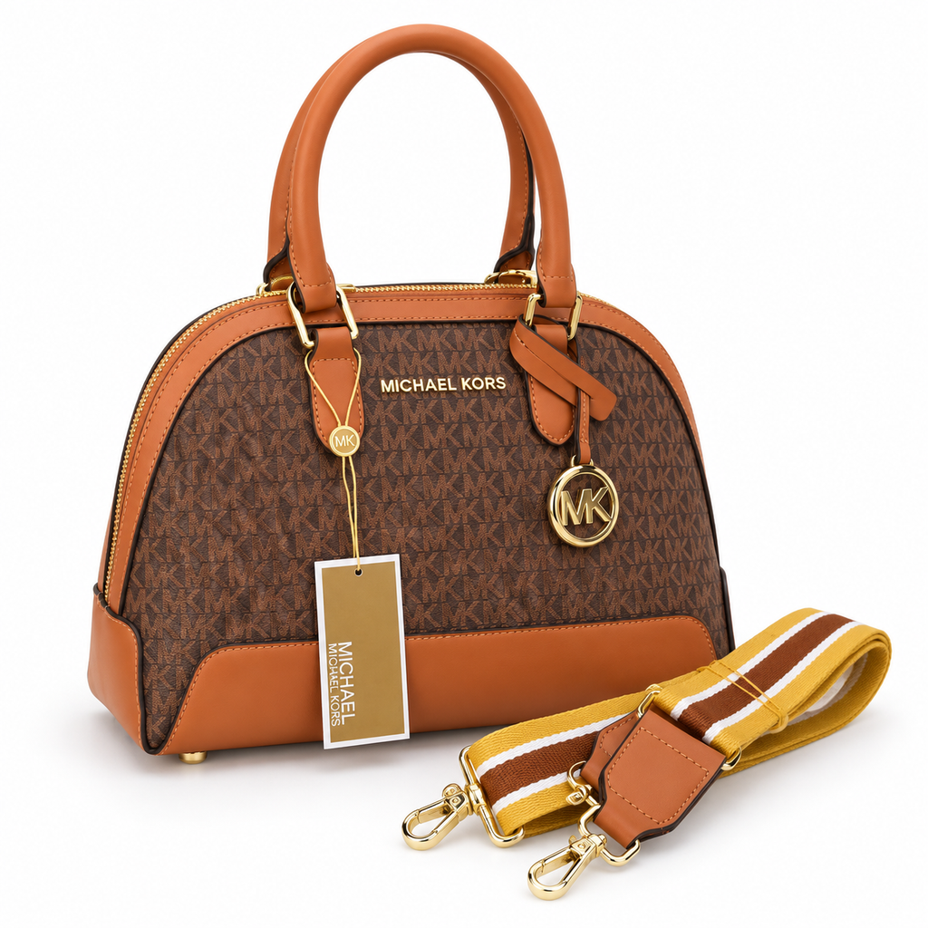 Michael Kors Alma signature MK monogram handbag with broad shoulder belt on a white background