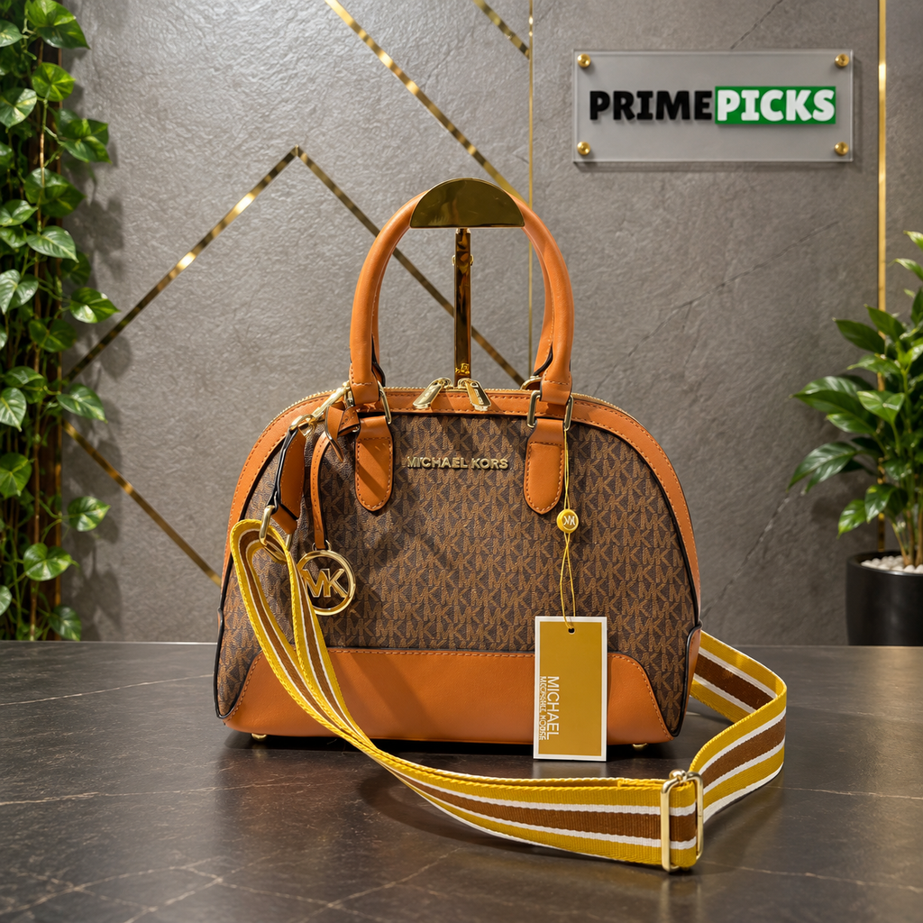 Michael Kors Alma monogram handbag with broad belt in the PrimePicks grey-and-gold office display
