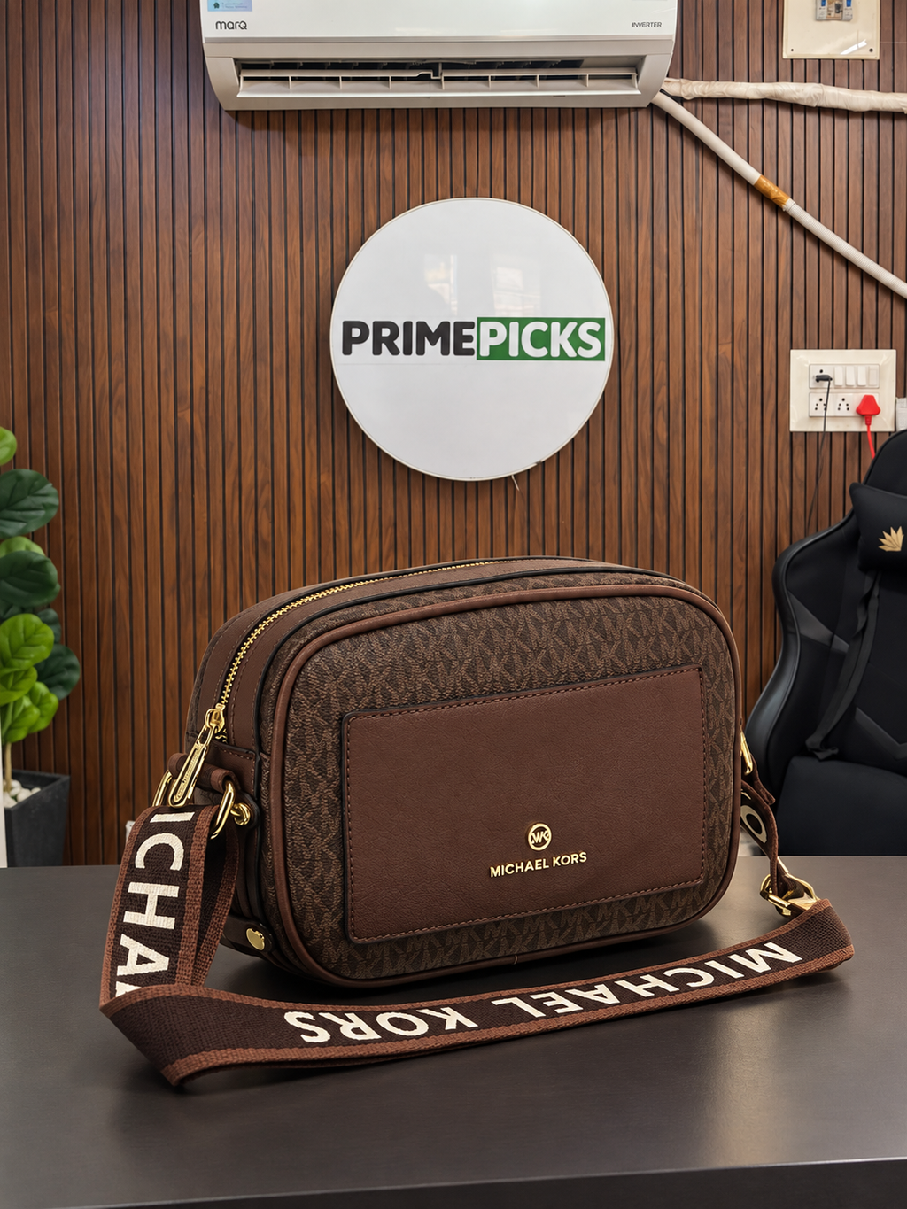 Michael Kors Bradshaw brown camera sling bag at PrimePicks office