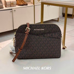 Michael Kors Jet Set Travel dome crossbody bag in Brown Signature retail view