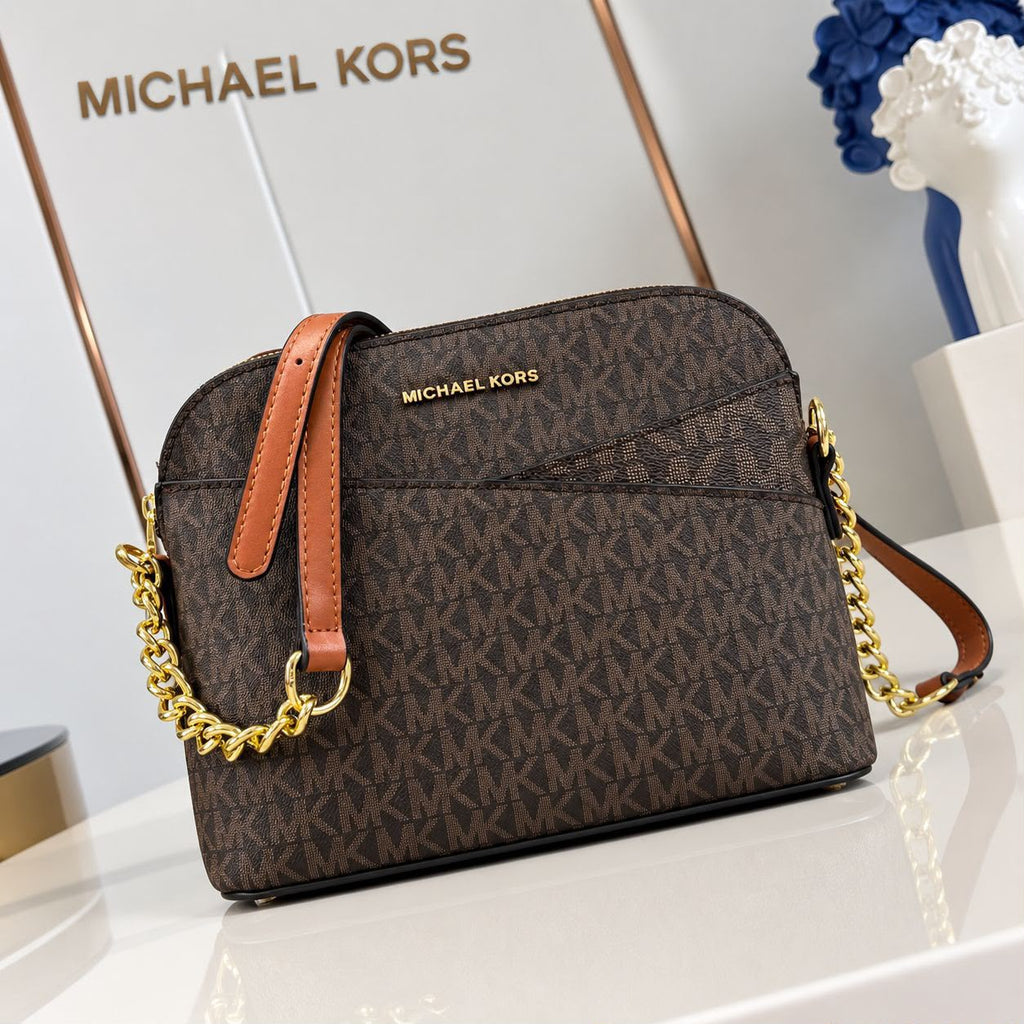 Michael Kors Jet Set Travel dome crossbody bag in Brown Signature included studio view