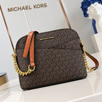 Michael Kors Jet Set Travel dome crossbody bag in Brown Signature included studio view