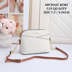 Michael Kors Jet Set Travel dome crossbody bag in Vanilla Signature with size reference