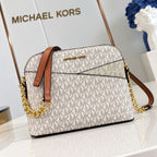 Michael Kors Jet Set Travel dome crossbody bag in Vanilla Signature included studio view