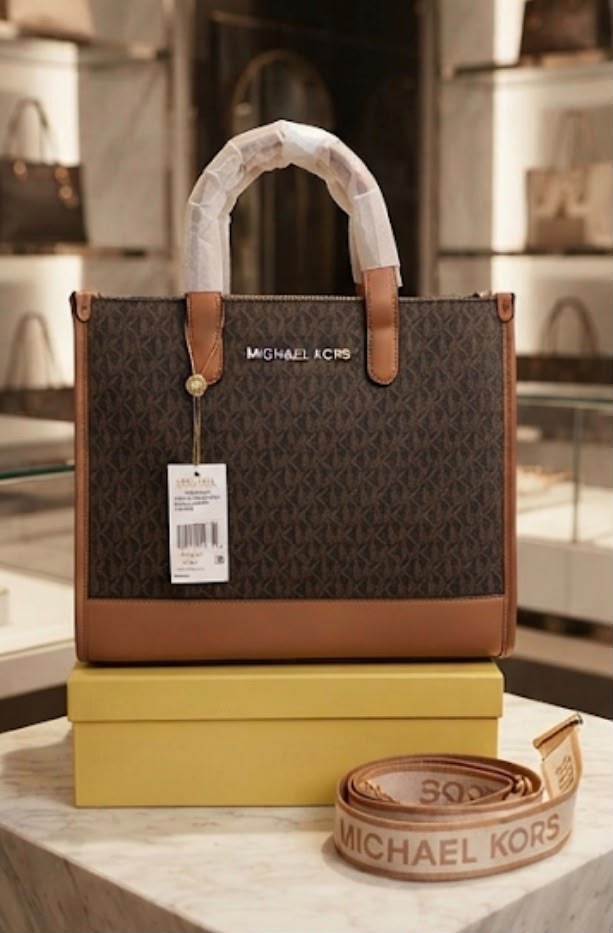 Michael Kors Mini Tote in Brown Signature with included box and shoulder strap