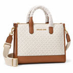 Michael Kors Mini Tote in Vanilla Signature on a white background