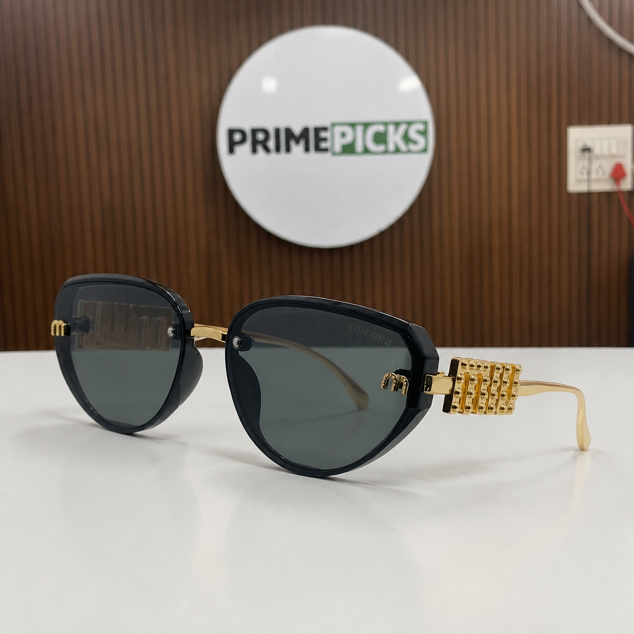 Miu Miu jeweled hinge sunglasses in glossy black, alternate angle