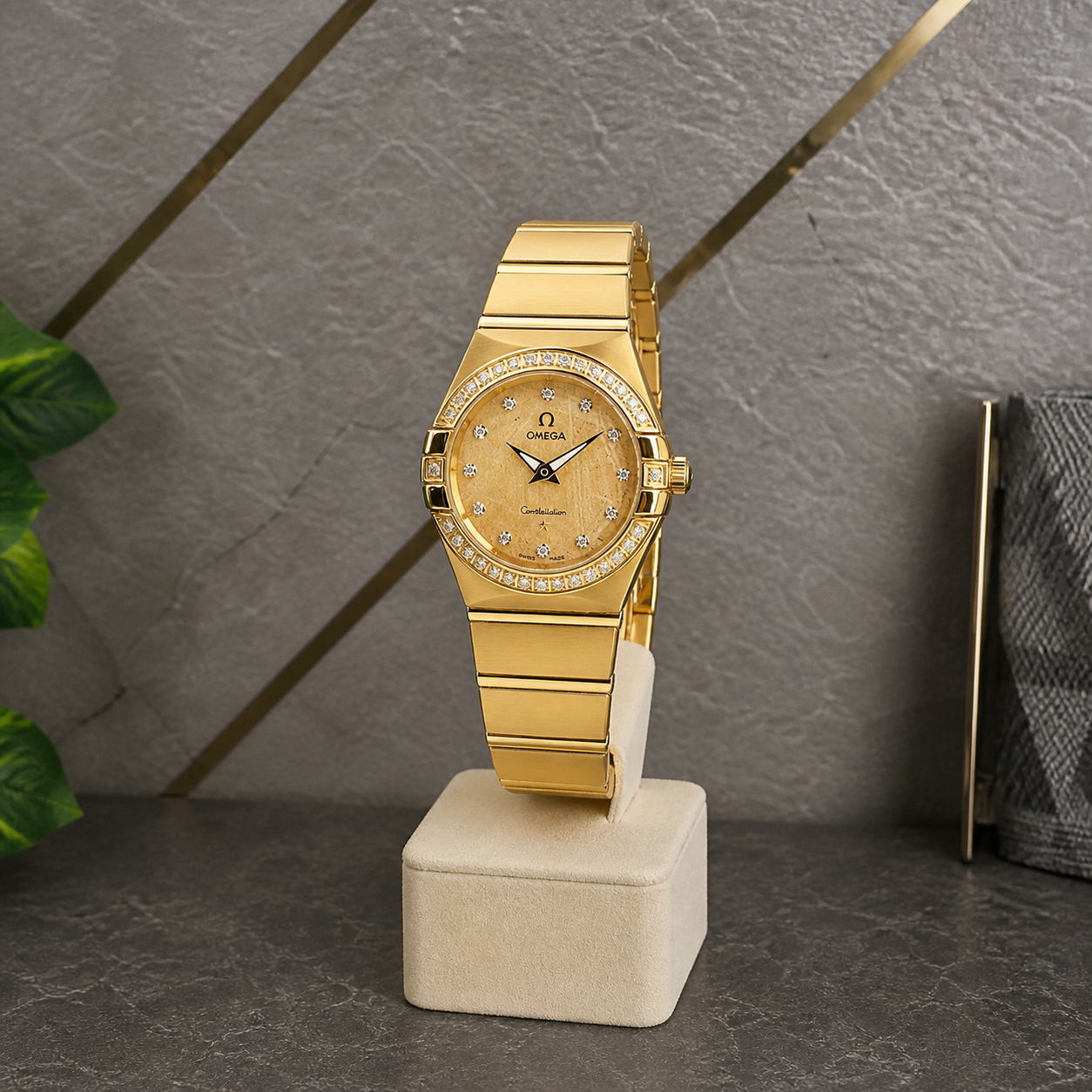 Omega Constellation rose-gold-tone watch in grey and gold office