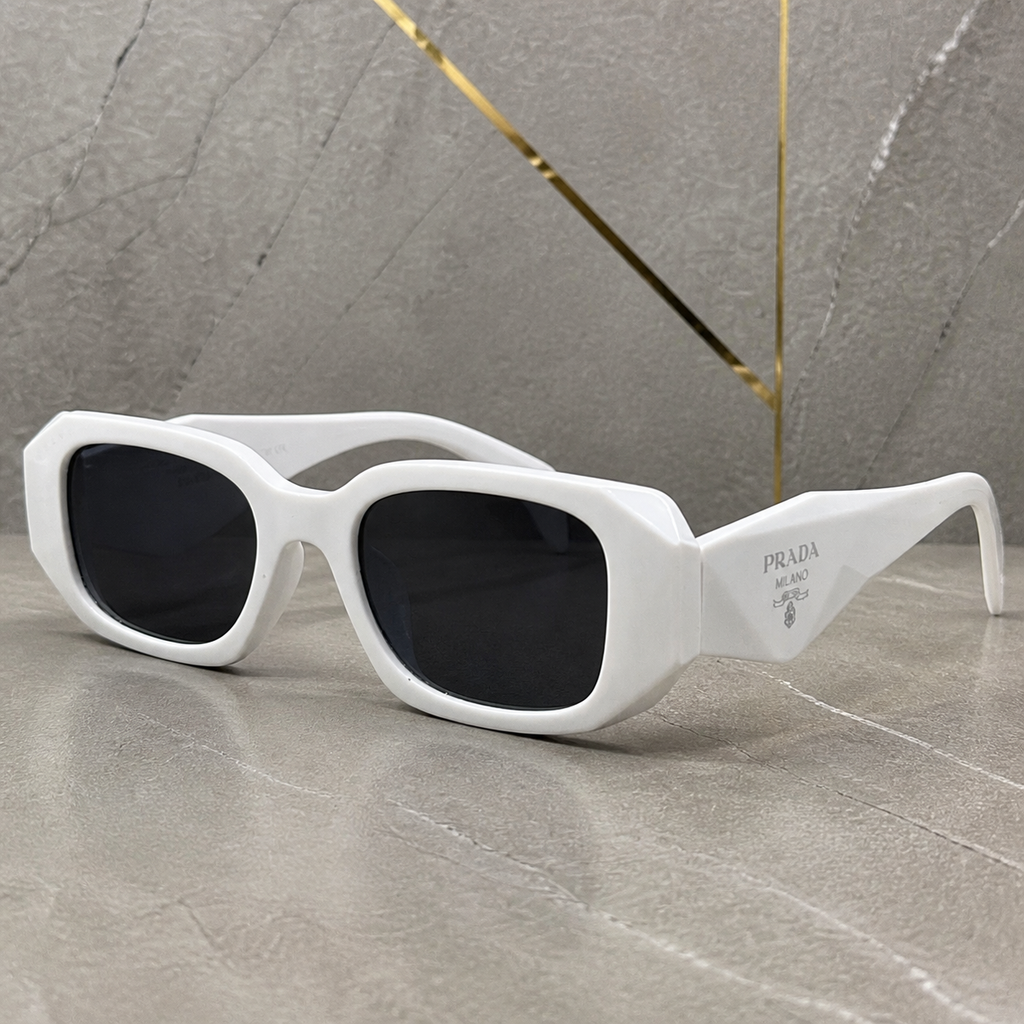 Prada Milano angular rectangular sunglasses in bright white, faceted frame and temple detail