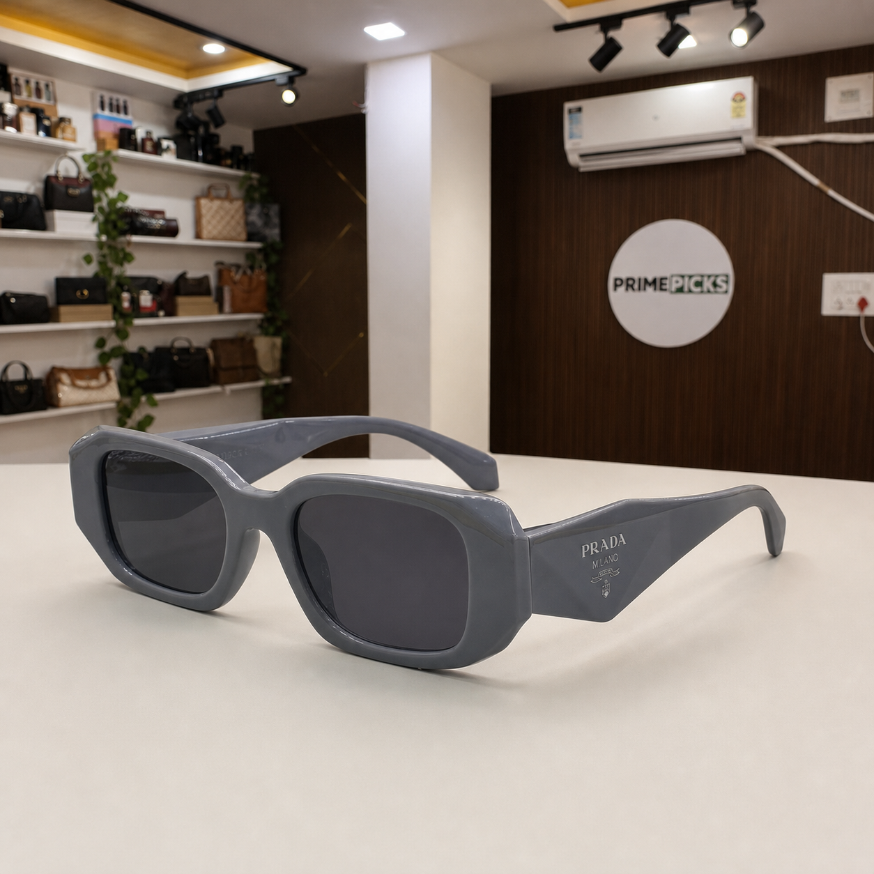 Prada Milano angular rectangular sunglasses in slate grey, alternate angle