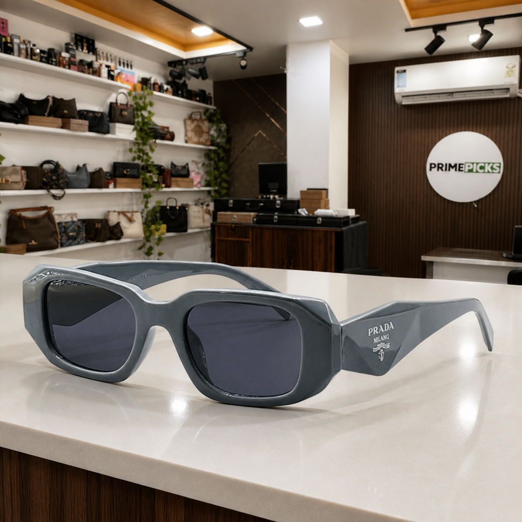 Prada Milano angular rectangular sunglasses in slate grey, PrimePicks office display