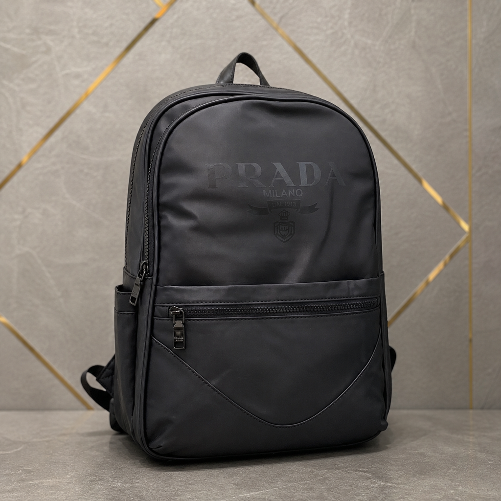 Prada Re-Nylon backpack tonal branding, zipper and front pocket details