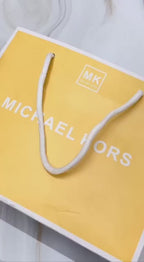 Michael Kors MK5815 gold-tone watch with turquoise dial product video