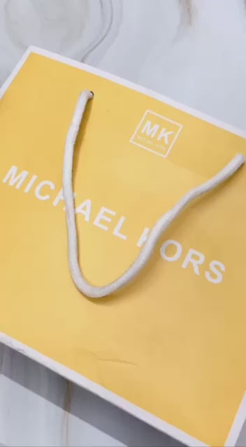 Michael Kors MK5815 gold-tone watch with turquoise dial product video