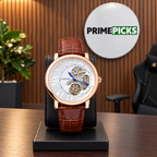 Cartier Style skeleton watch in rose gold tone with white dial and brown strap in PrimePicks office
