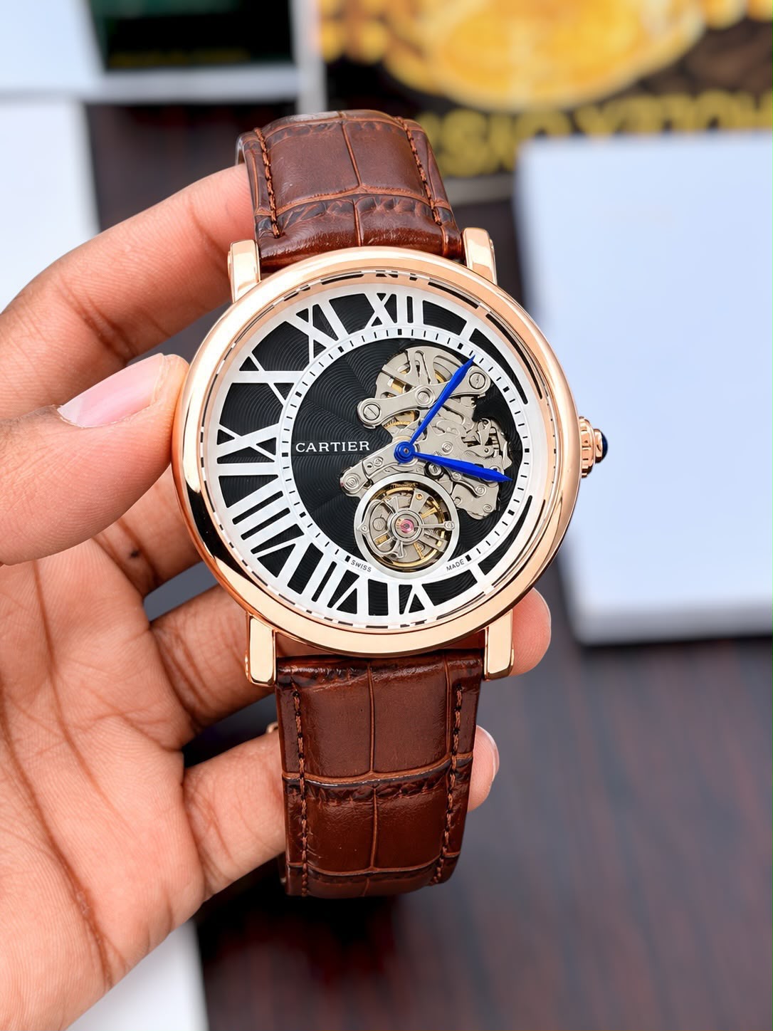 Cartier Style skeleton watch in rose gold tone with black dial and brown strap original view