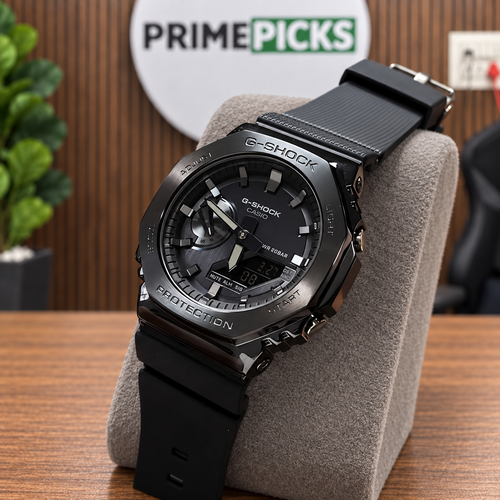 Black and gunmetal replica watch in a digitally composited PRIMEPICKS office scene
