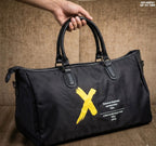 Supplier photograph showing the black bag held by its top handles