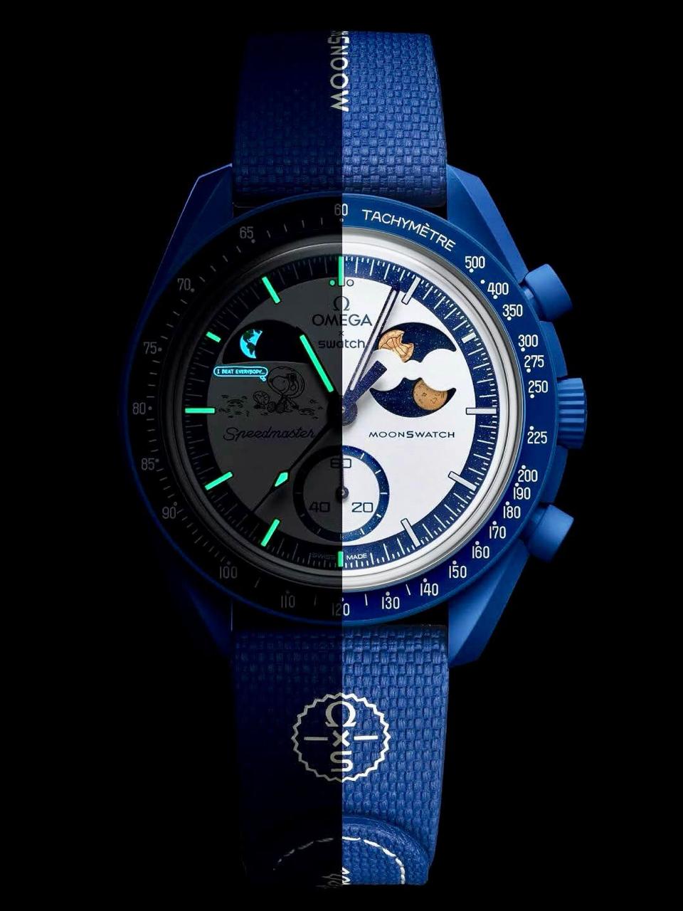 Low-light view showing luminous dial details on the MoonSwatch Mission to Earthphase replica watch