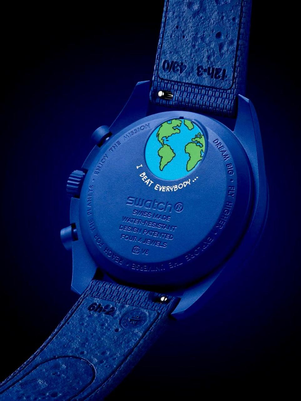 Dark studio view of the navy caseback and strap underside