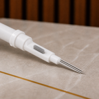 Close-up of PrimePicks Multi-Clean Pen side brush and metal tip