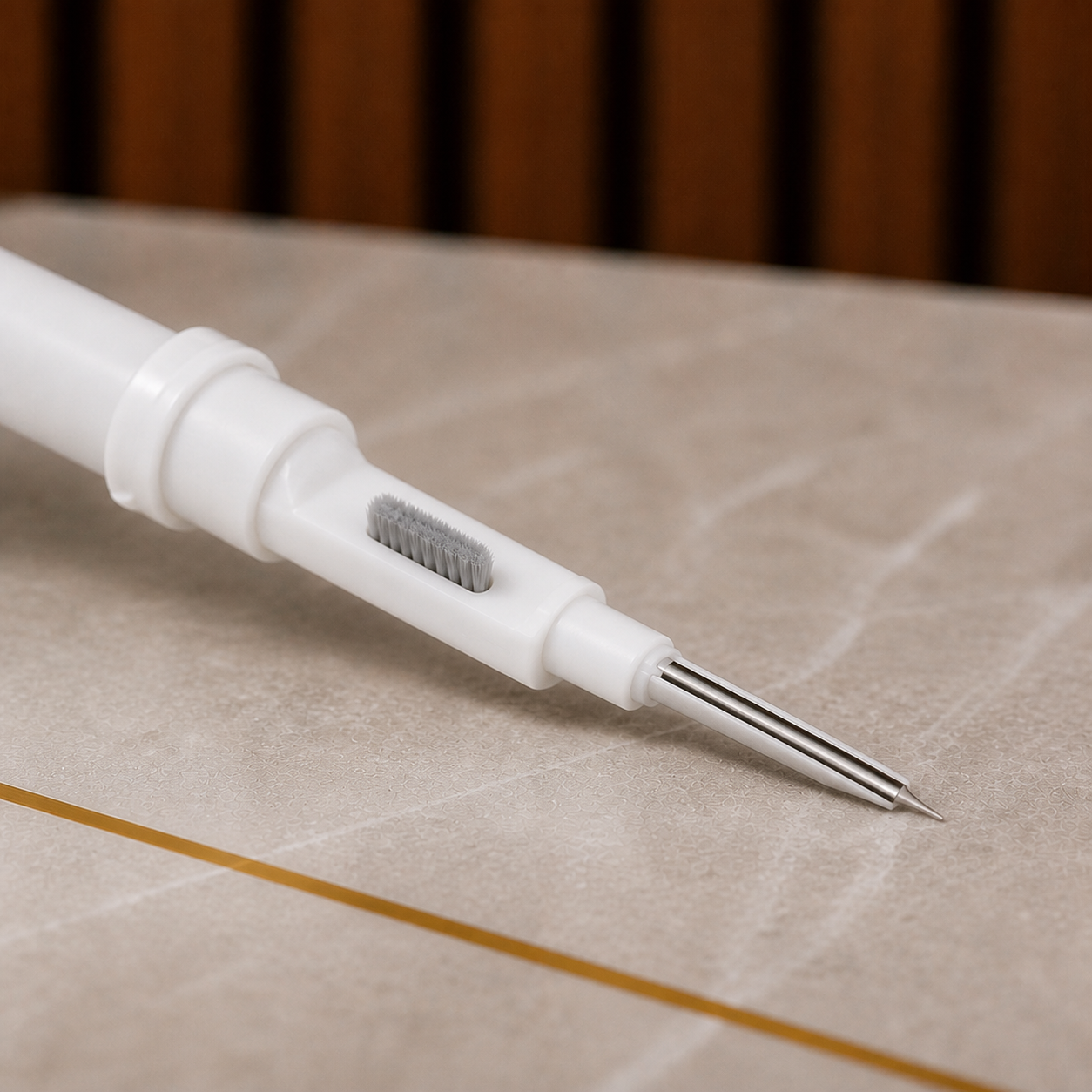 Close-up of PrimePicks Multi-Clean Pen side brush and metal tip