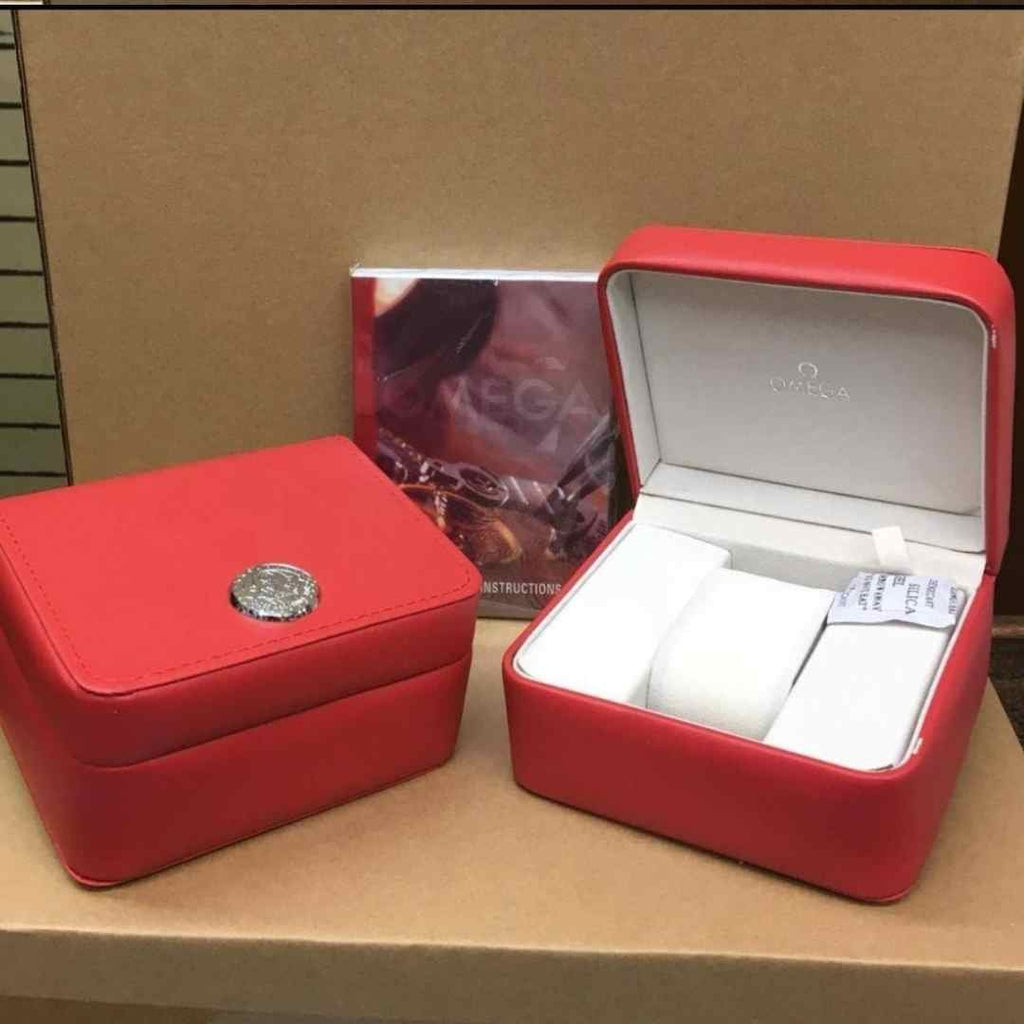 Supplier reference photograph of Omega red presentation packaging and booklet; included set contents are listed in the description