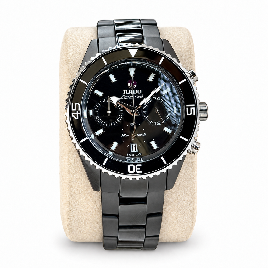 AI-edited Captain Cook replica watch on cream cushion against white