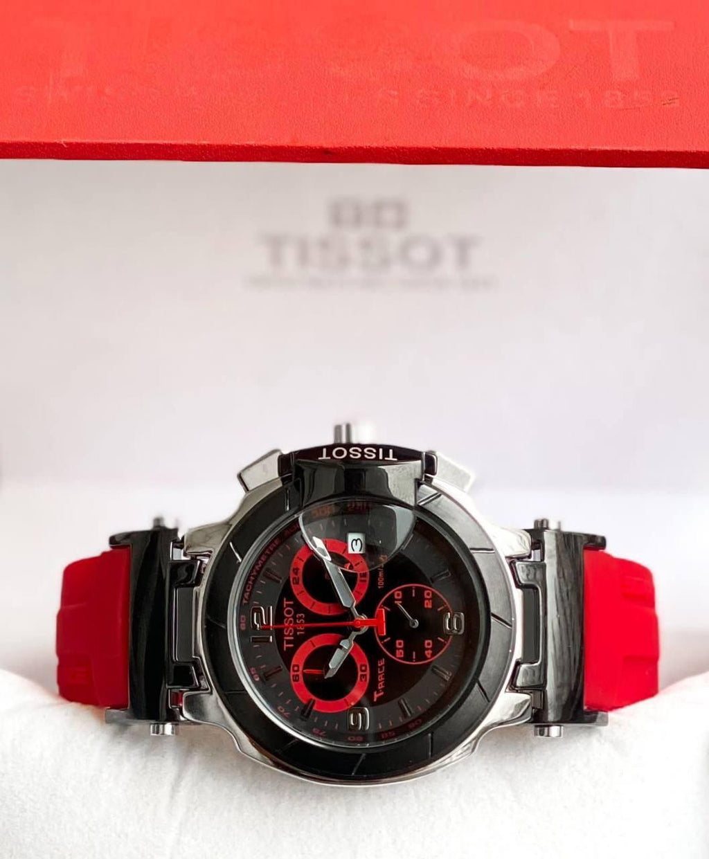 Actual supplied T-Race replica watch with red strap and black dial
