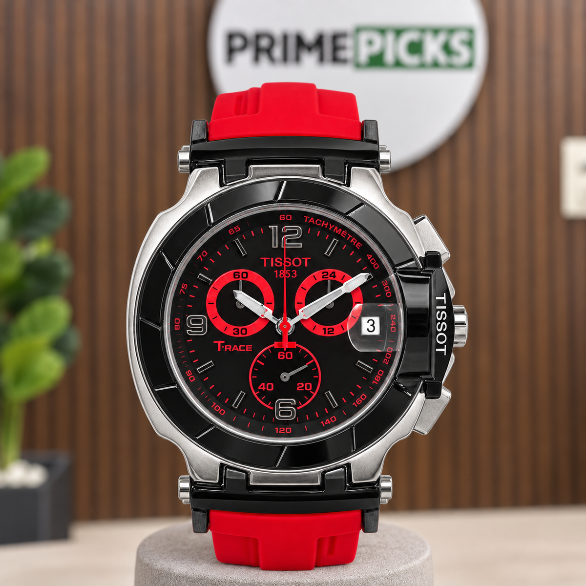 T-Race replica watch composited against PRIMEPICKS wood-slat office wall