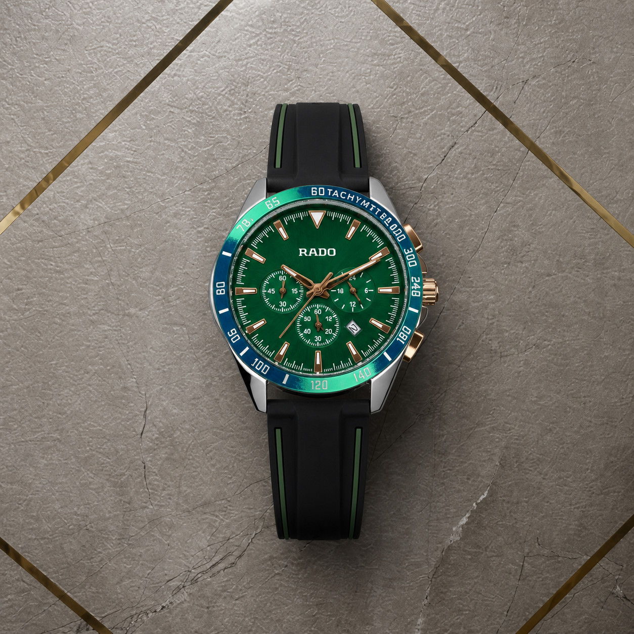 Rado HyperChrome green-dial chronograph watch on gray office wall
